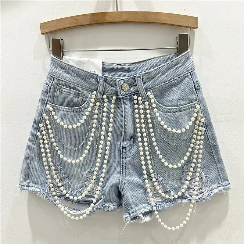 Buracos rasgados angustiados j - Distressed Jean Rip avaliação e preço