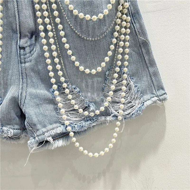 Buracos rasgados angustiados j - Distressed Jean Rip avaliação e preço